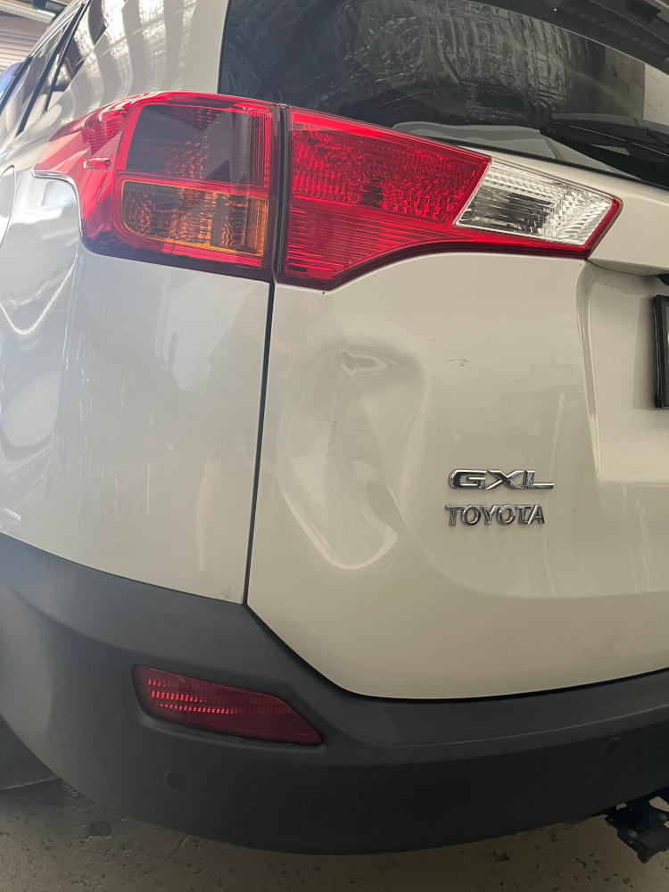 toyota GXL with a damage panel